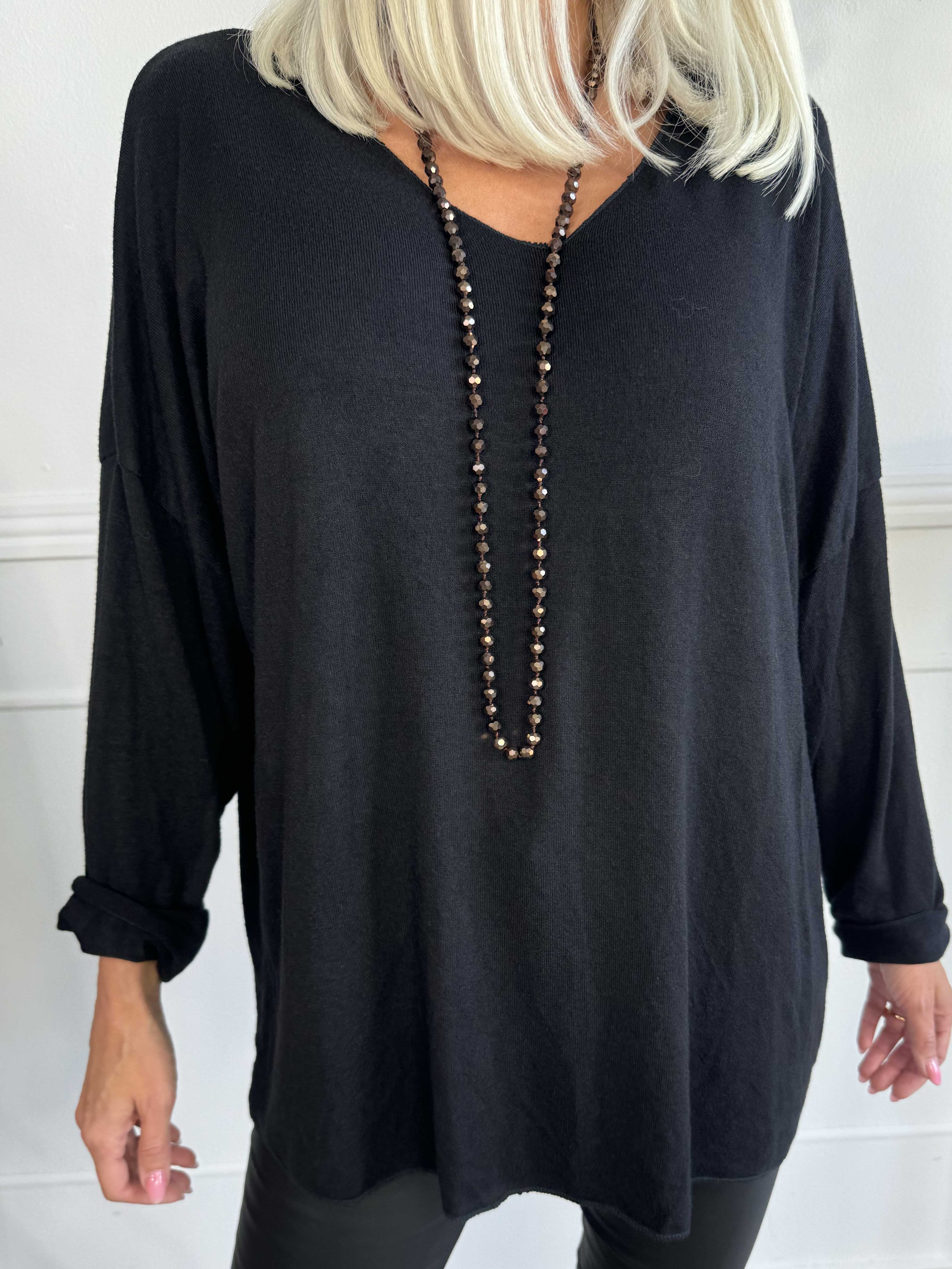 Djamila - Blus i mjuk viskos med v-ringning